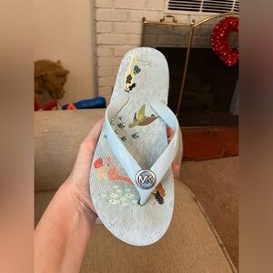 Michael Kors light blue flip flops